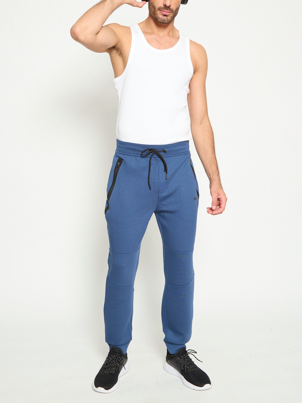 PANTALÓN BUZO HOMBRE REVUP CORTES - 4