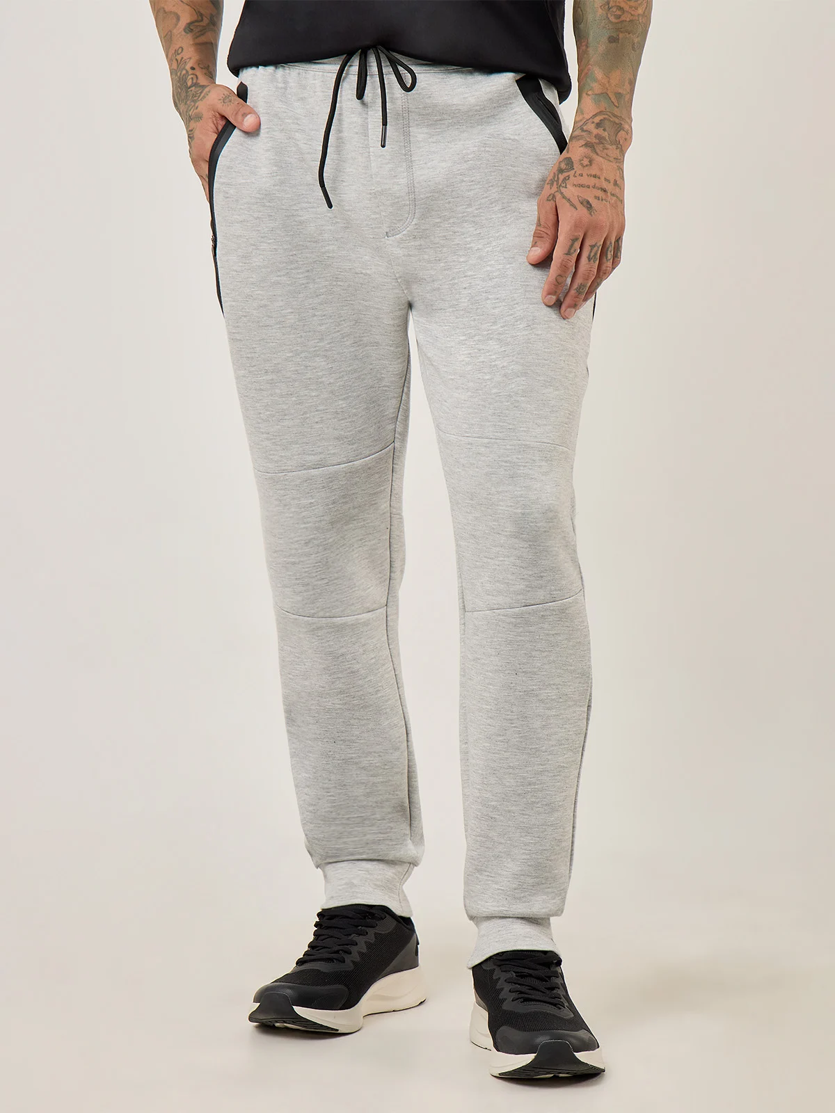 PANTALÓN BUZO HOMBRE REVUP CORTES - 1