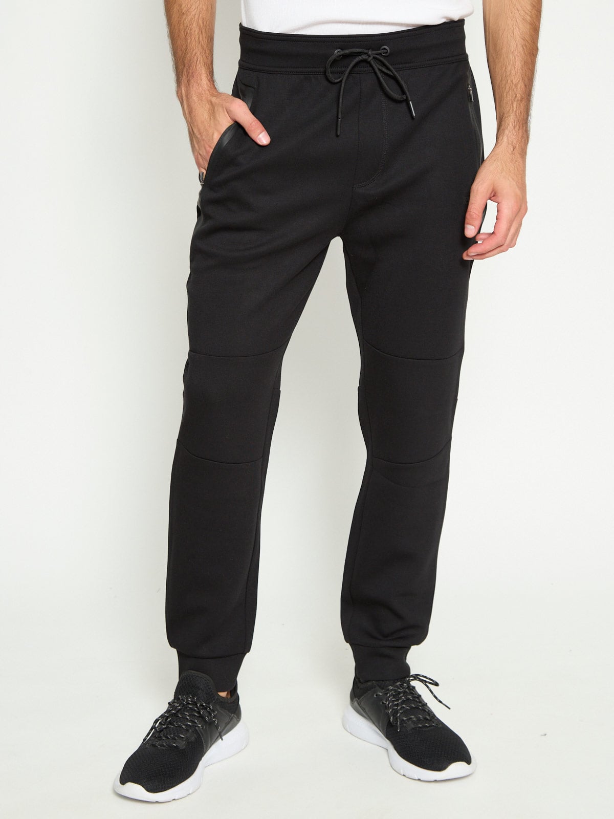 PANTALÓN BUZO HOMBRE REVUP CORTES - 1