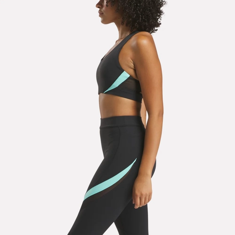 TOP DEPORTIVO MUJER REEBOK LUX RACER CB - 3