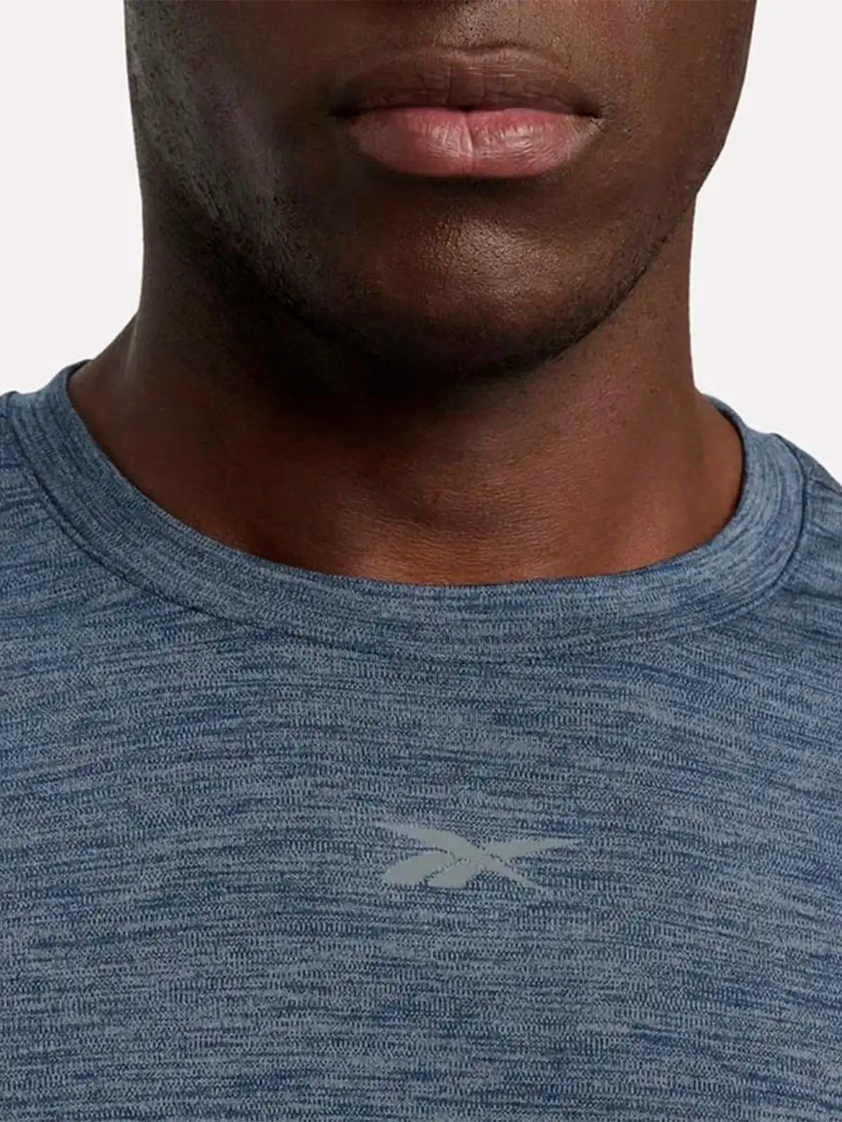 POLERA DEPORTIVA HOMBRE REEBOK ID TRAIN MELANGE TECH TEE - 4