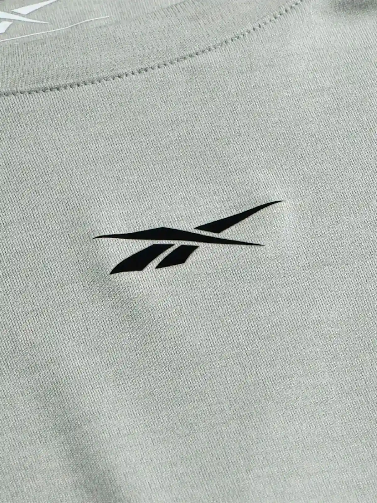 POLERA DEPORTIVA HOMBRE REEBOK ID TRAIN MELANGE TECH TEE - 3