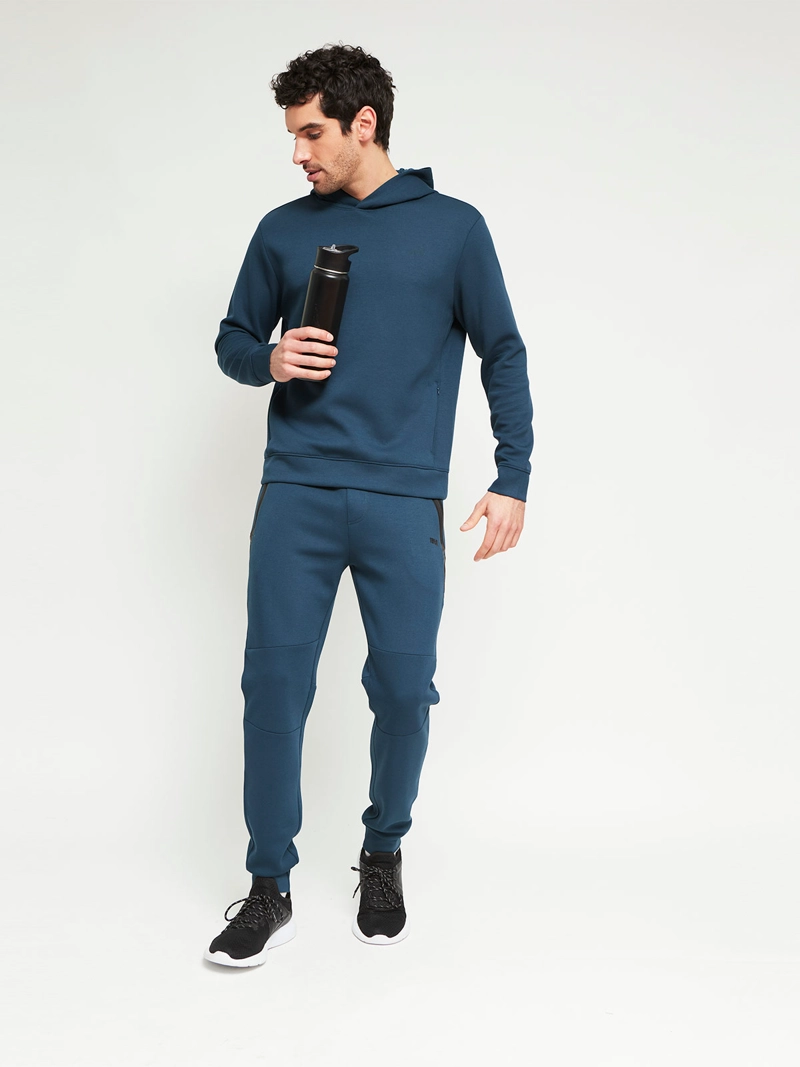 PANTALÓN BUZO HOMBRE REVUP CORTES - 4