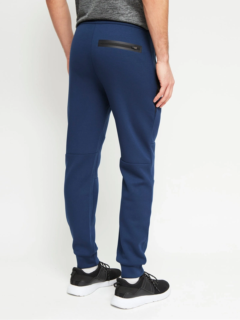 PANTALÓN BUZO HOMBRE REVUP CORTES - 2