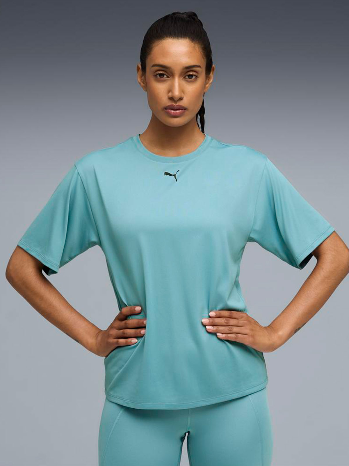 POLO DEPORTIVO MUJER PUMA TAD ESSENTIAL RELAXED TURQUESA - 1