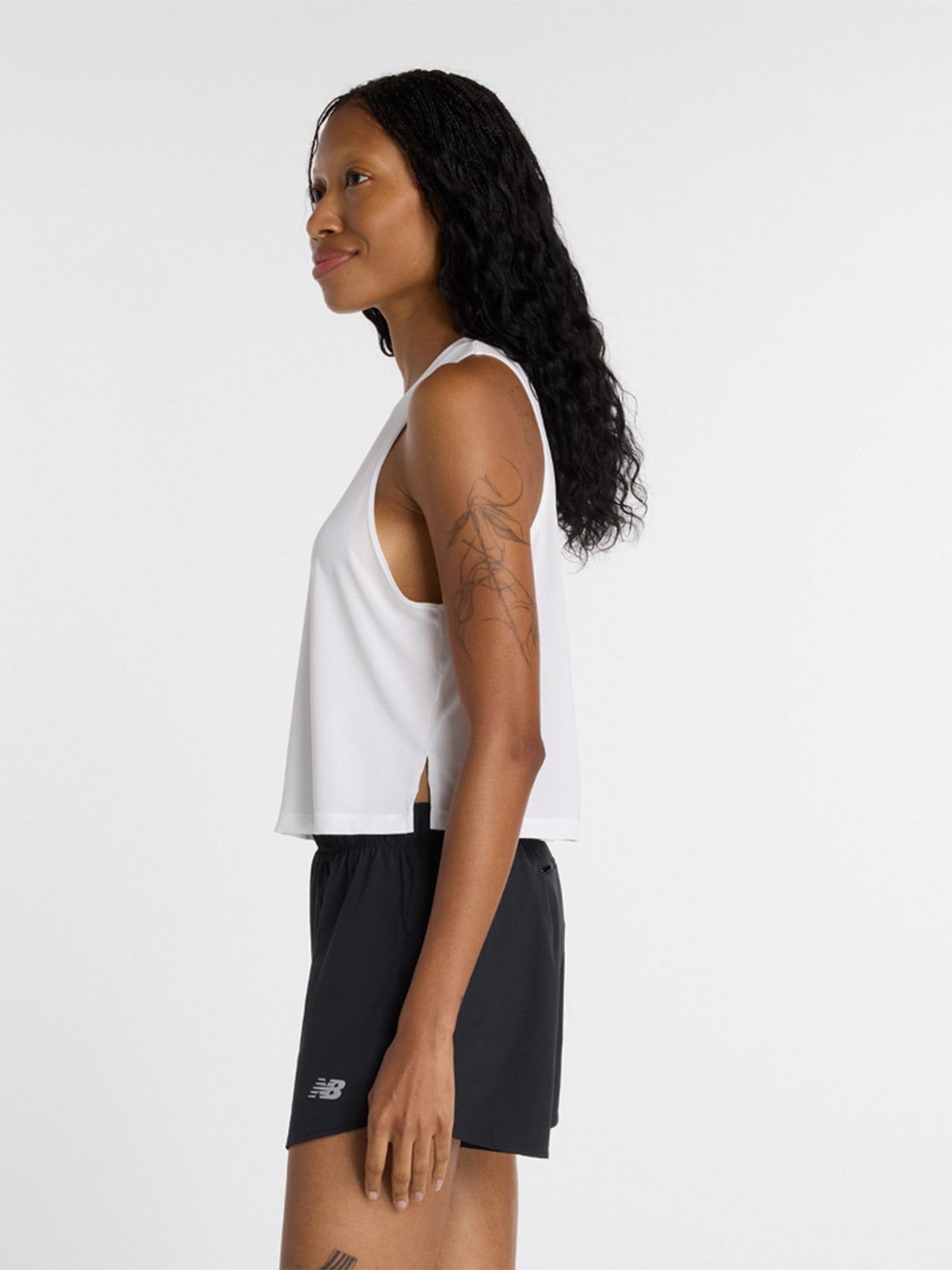 POLO MUJER NEW BALANCE TANK WT6194Q9WT - 2