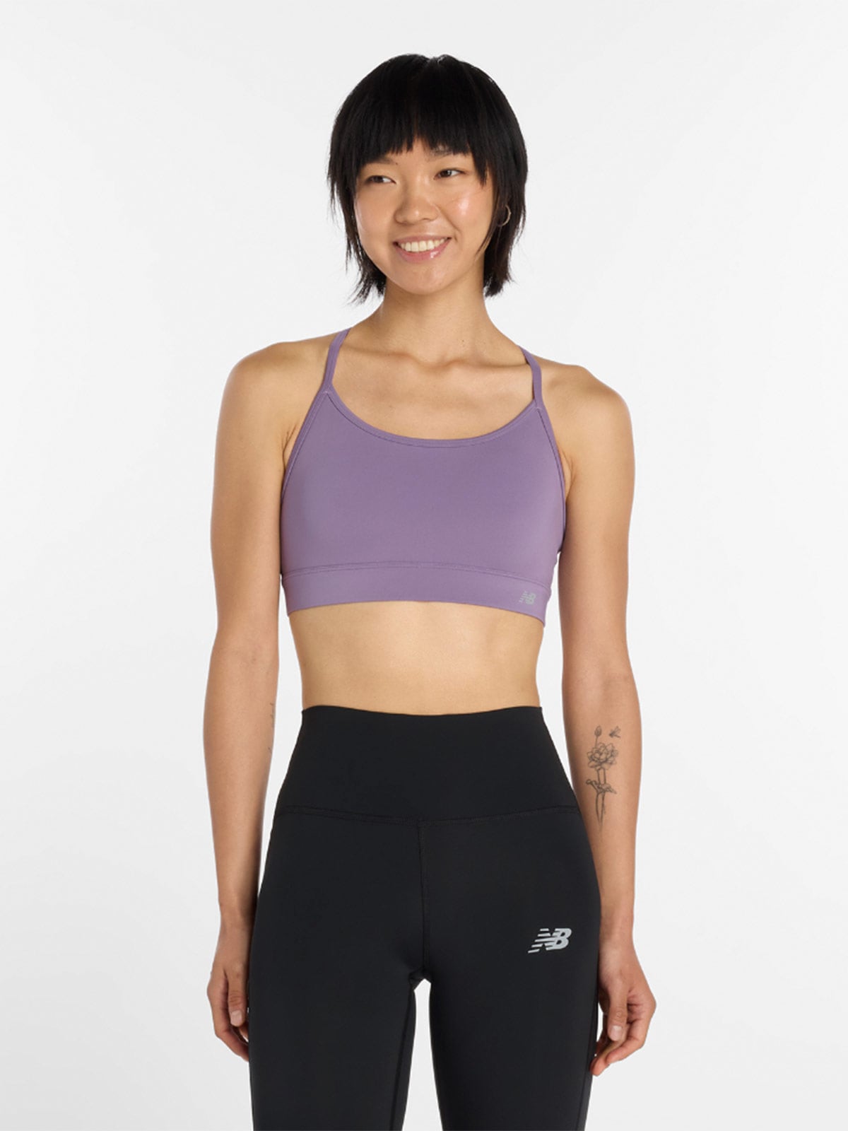 TOP DEPORTIVO MUJER NEW BALANCE VIOLETA - 1
