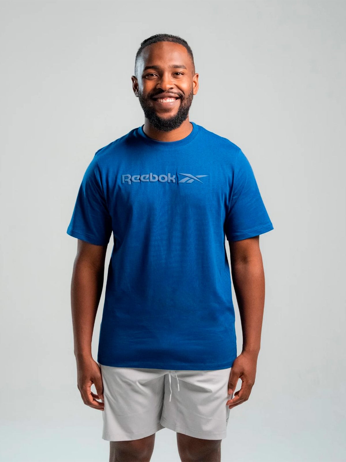 POLO HOMBRE REEBOK BIG LONG LOGO - 1