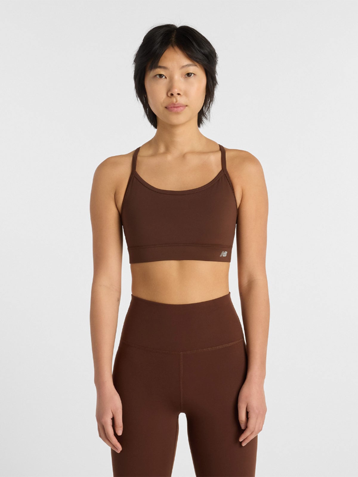 TOP DEPORTIVO MUJER NEW BALANCE MARRÓN - 1
