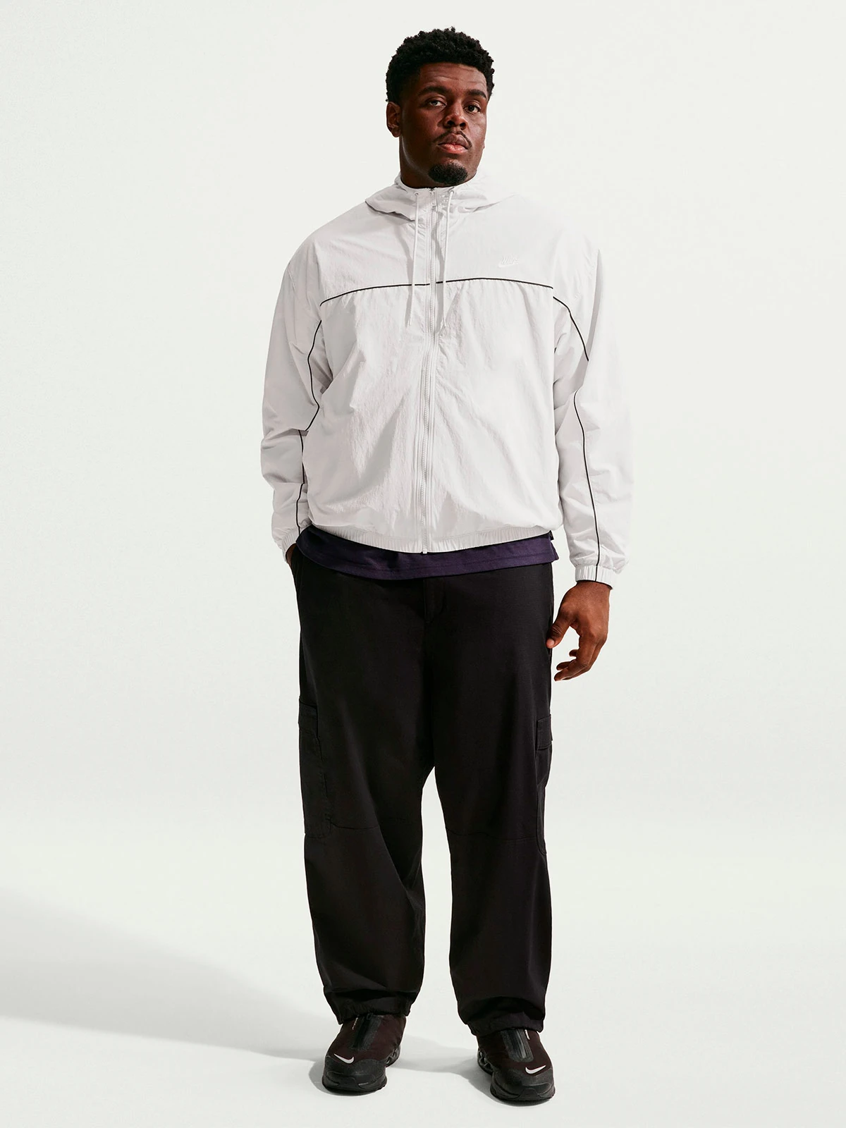 CASACA DEPORTIVA HOMBRE NIKE GRIS CLUB ATHLETE - 1