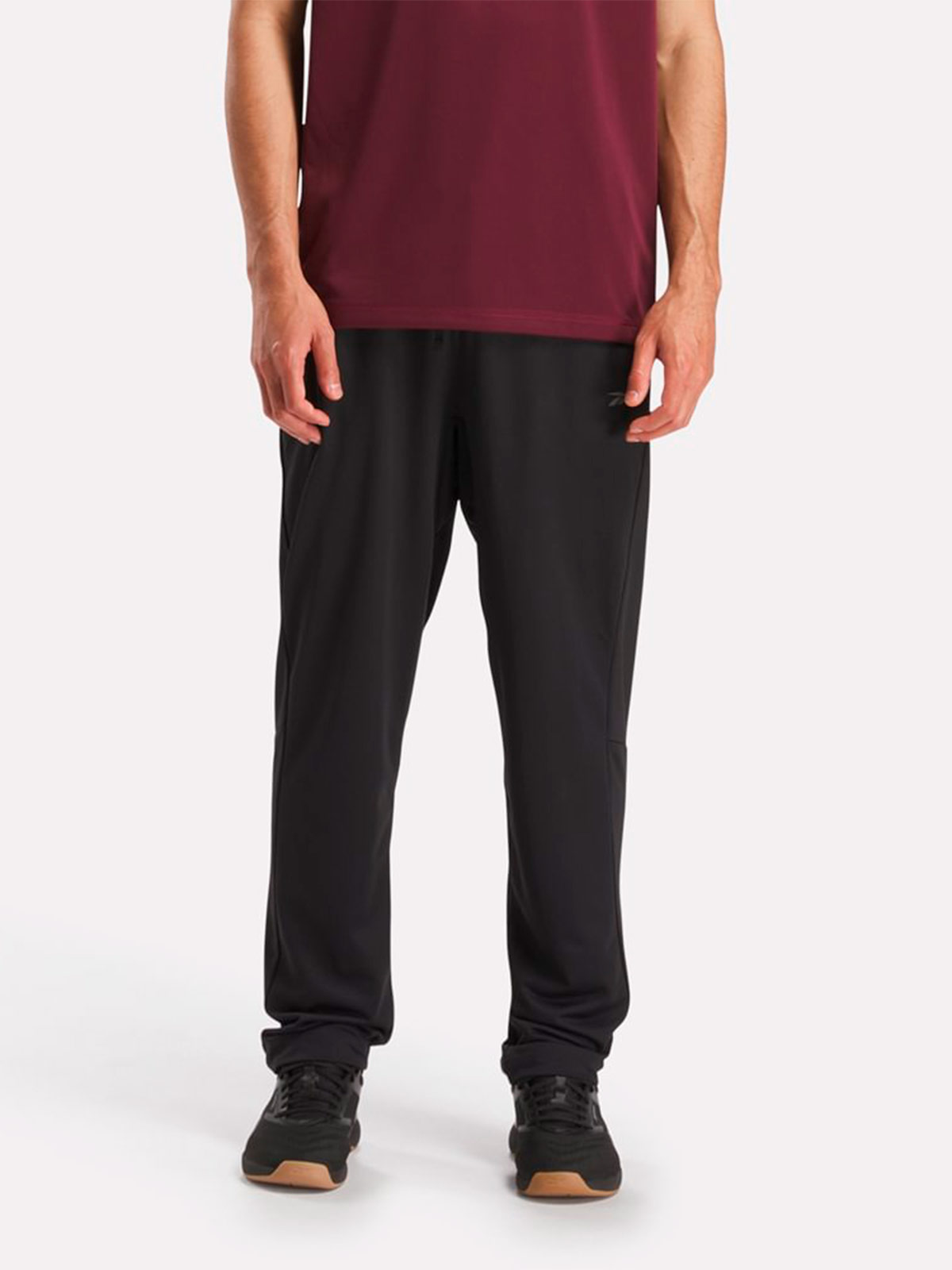 PANTALÓN BUZO HOMBRE REEBOK NEGRO ID TRAIN - 1