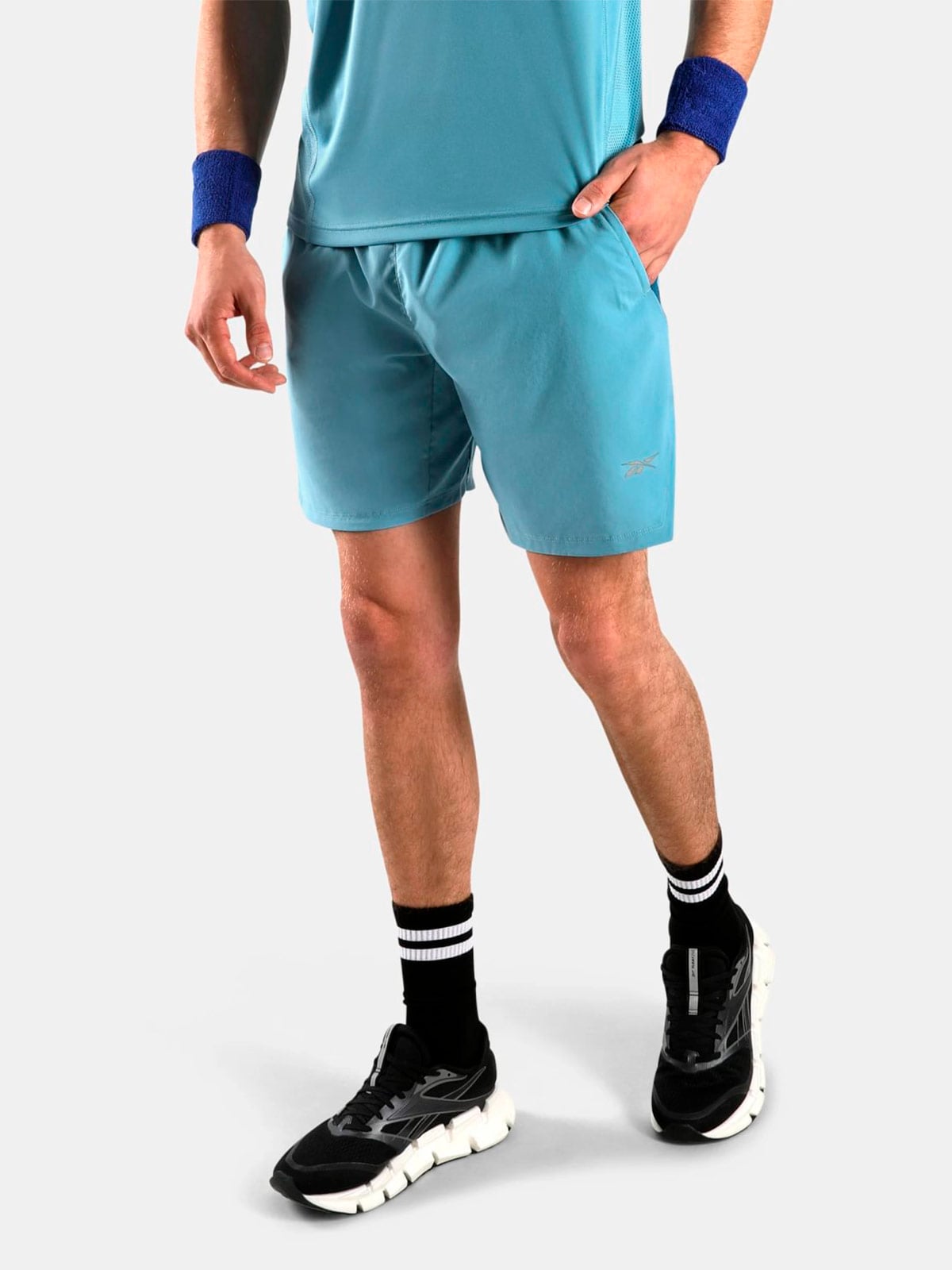SHORT HOMBRE REEBOK CELESTE - 1