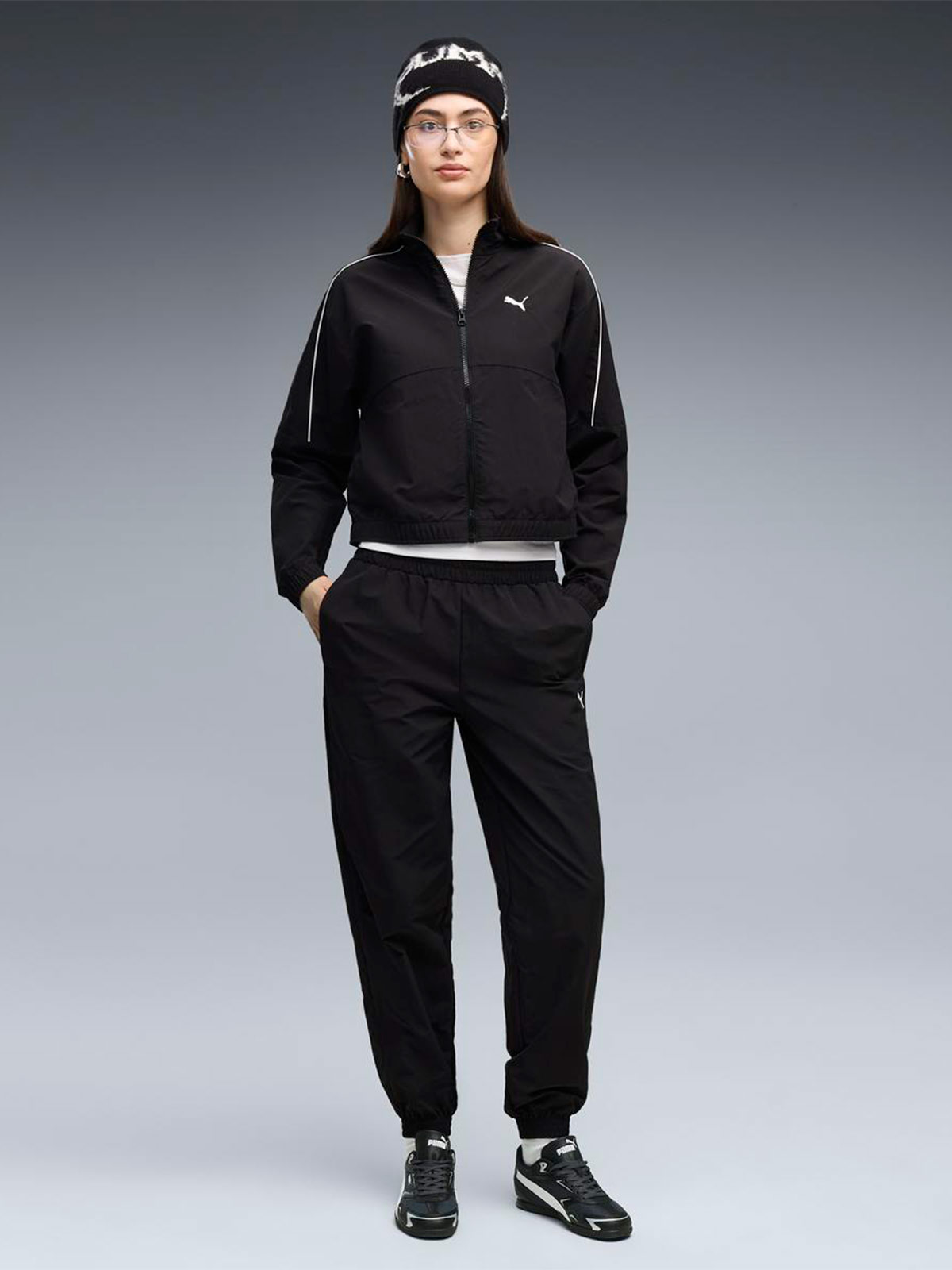 PANTALÓN BUZO MUJER PUMA NEGRO WOVEN - 1