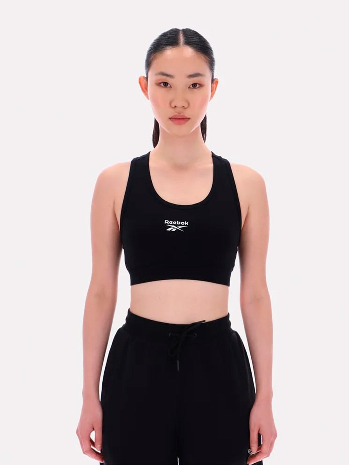 TOP MUJER REEBOK PIPER SCOOP - 1