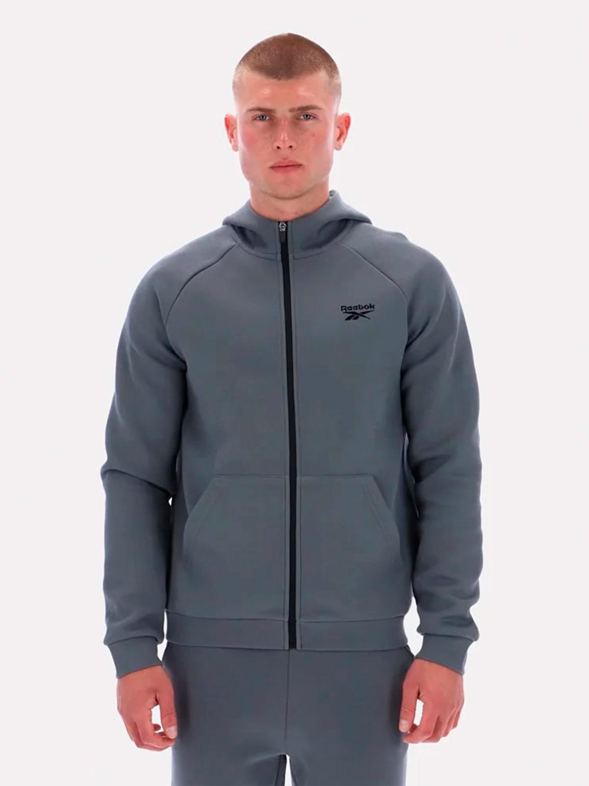 POLERA HOODIE ZIP HOMBRE REEBOK CORE THROUGH - 1