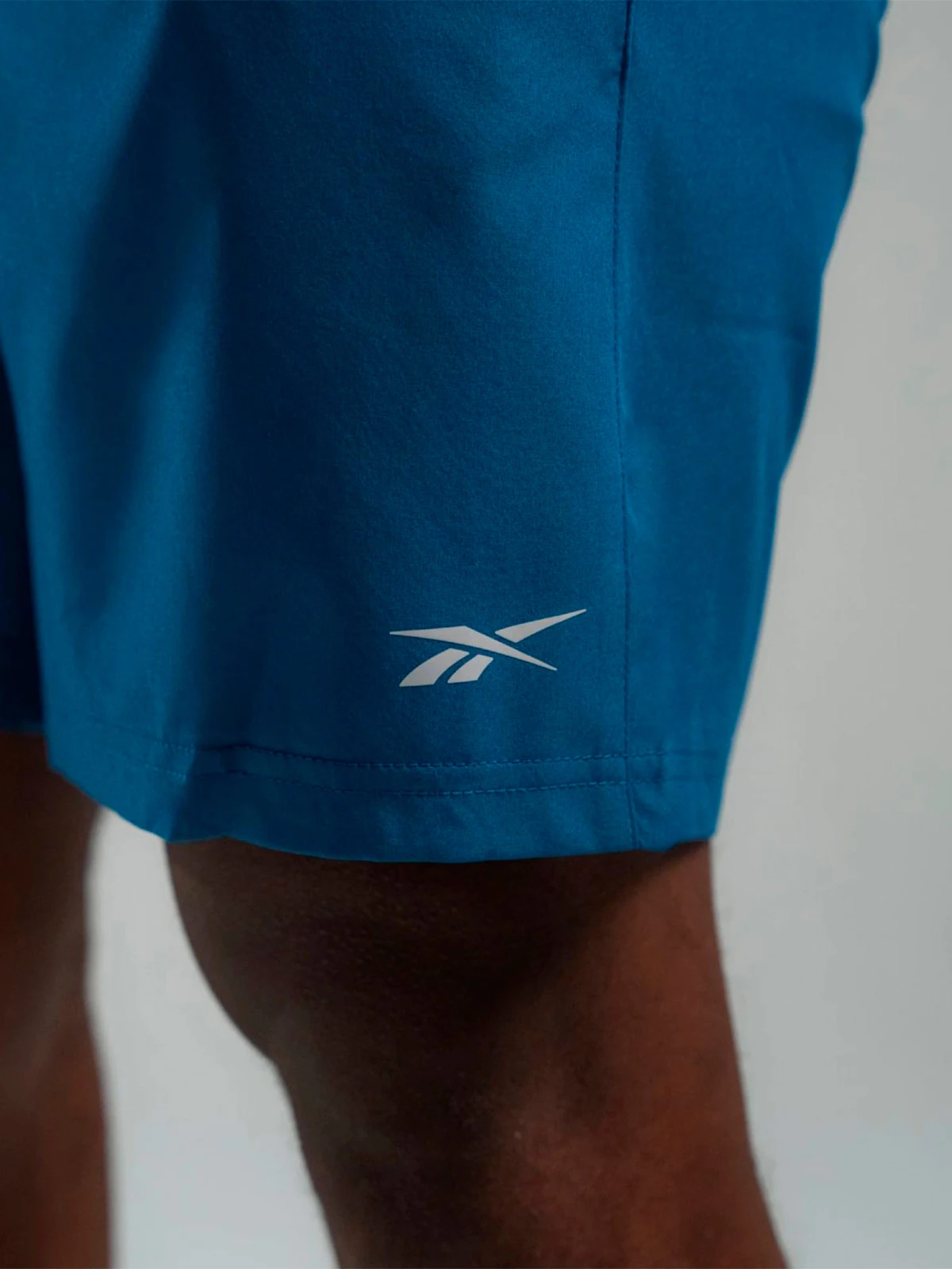 SHORT MUJER REEBOK ID TRAIN WOVEN - 4