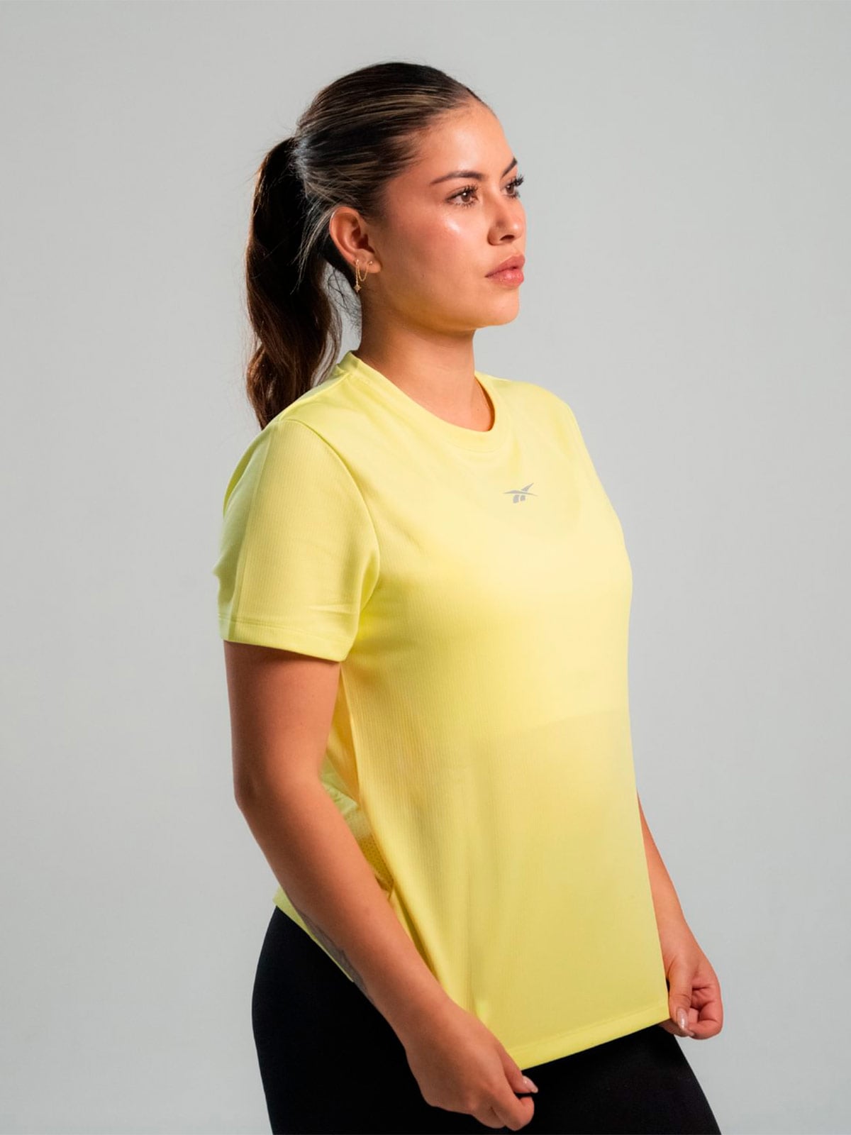 POLO MUJER REEBOK ID RUNNING - 2