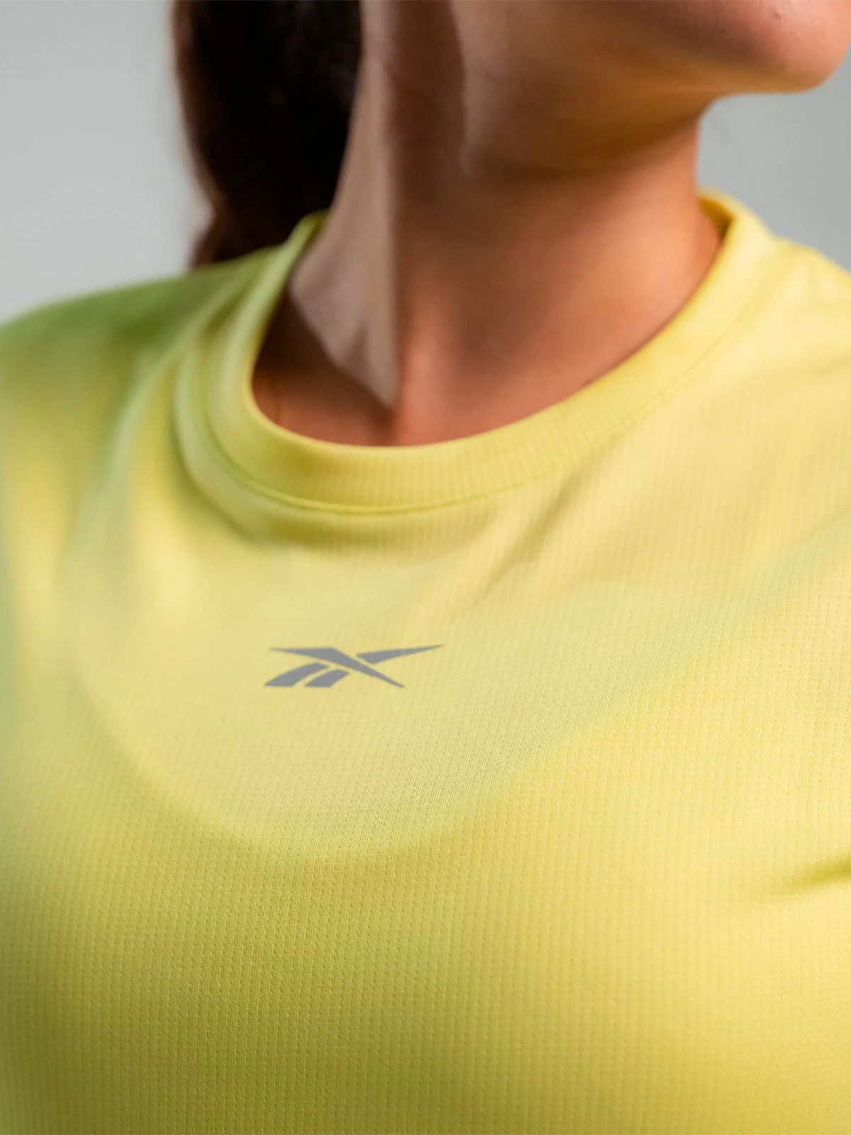 POLO MUJER REEBOK ID RUNNING - 4