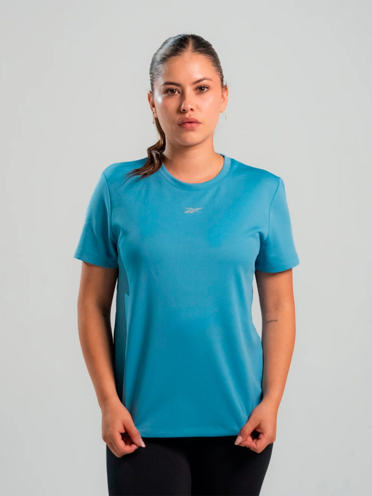 POLO MUJER REEBOK ID RUNNING - 1