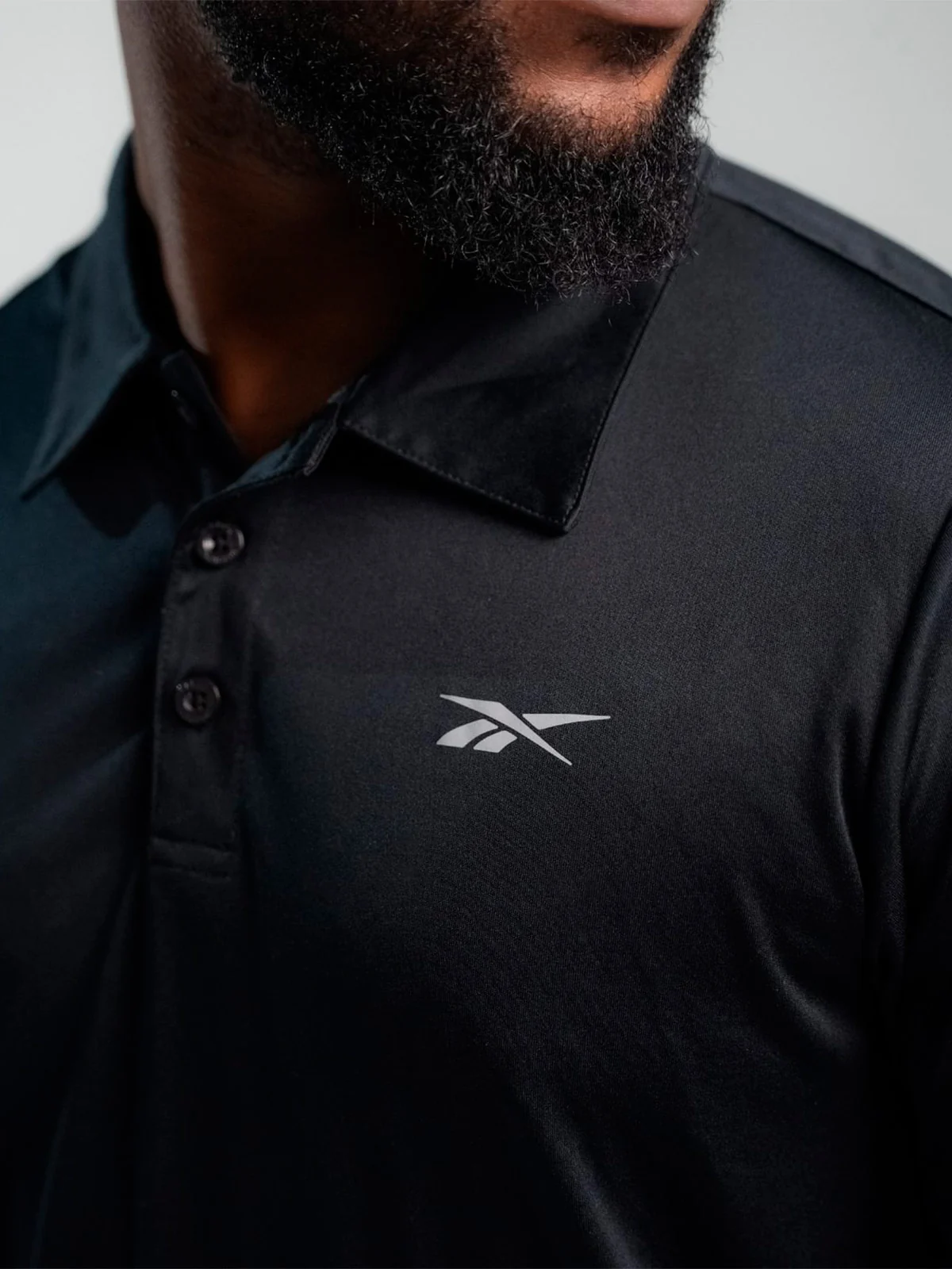 POLO HOMBRE REEBOK COURT - 4