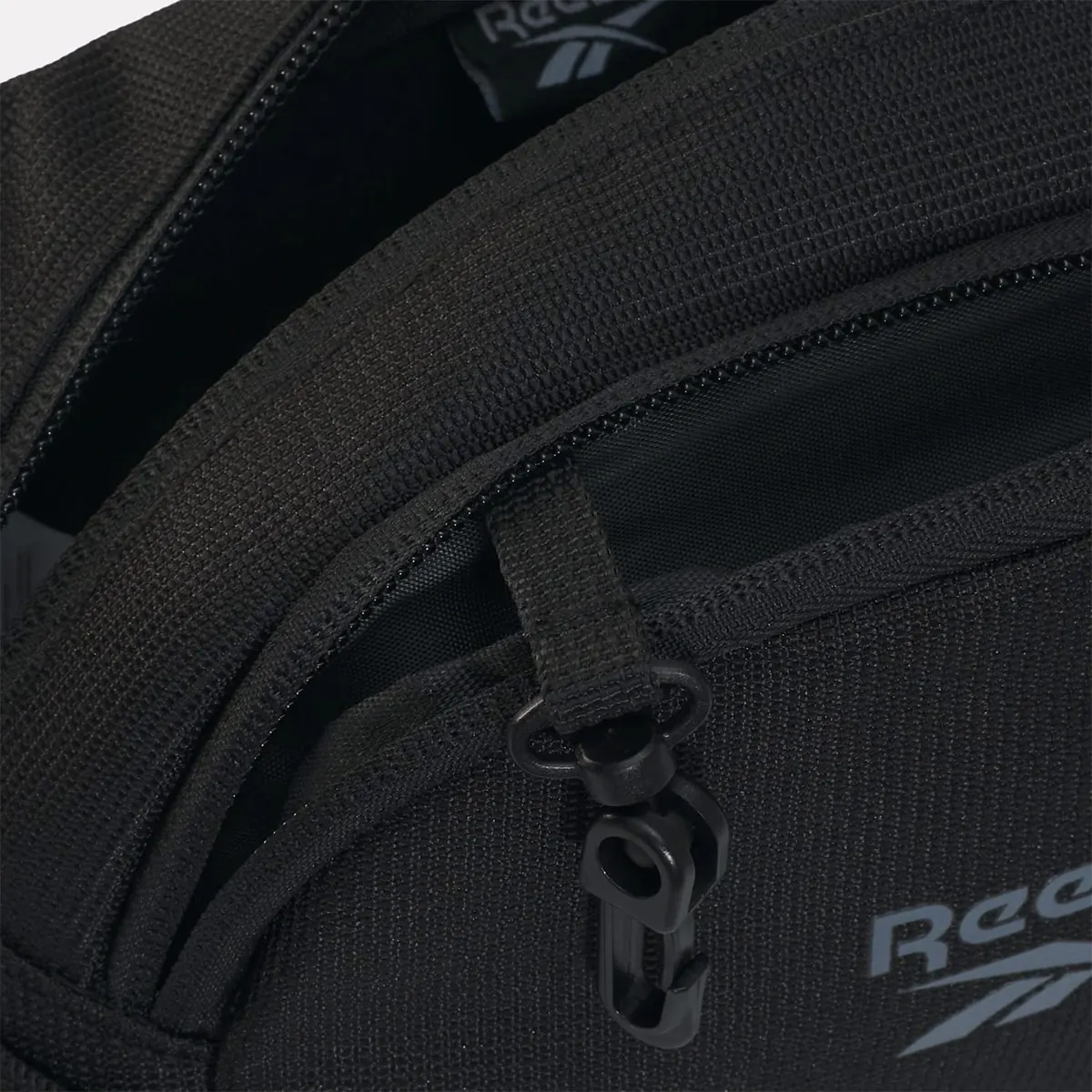 CANGURO REEBOK RESTORE - 5