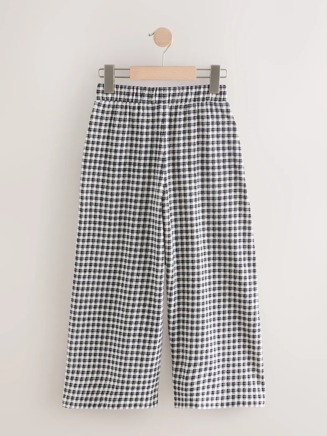 PANTALÓN DE BUZO CUADROS NIÑA NEXT - 3