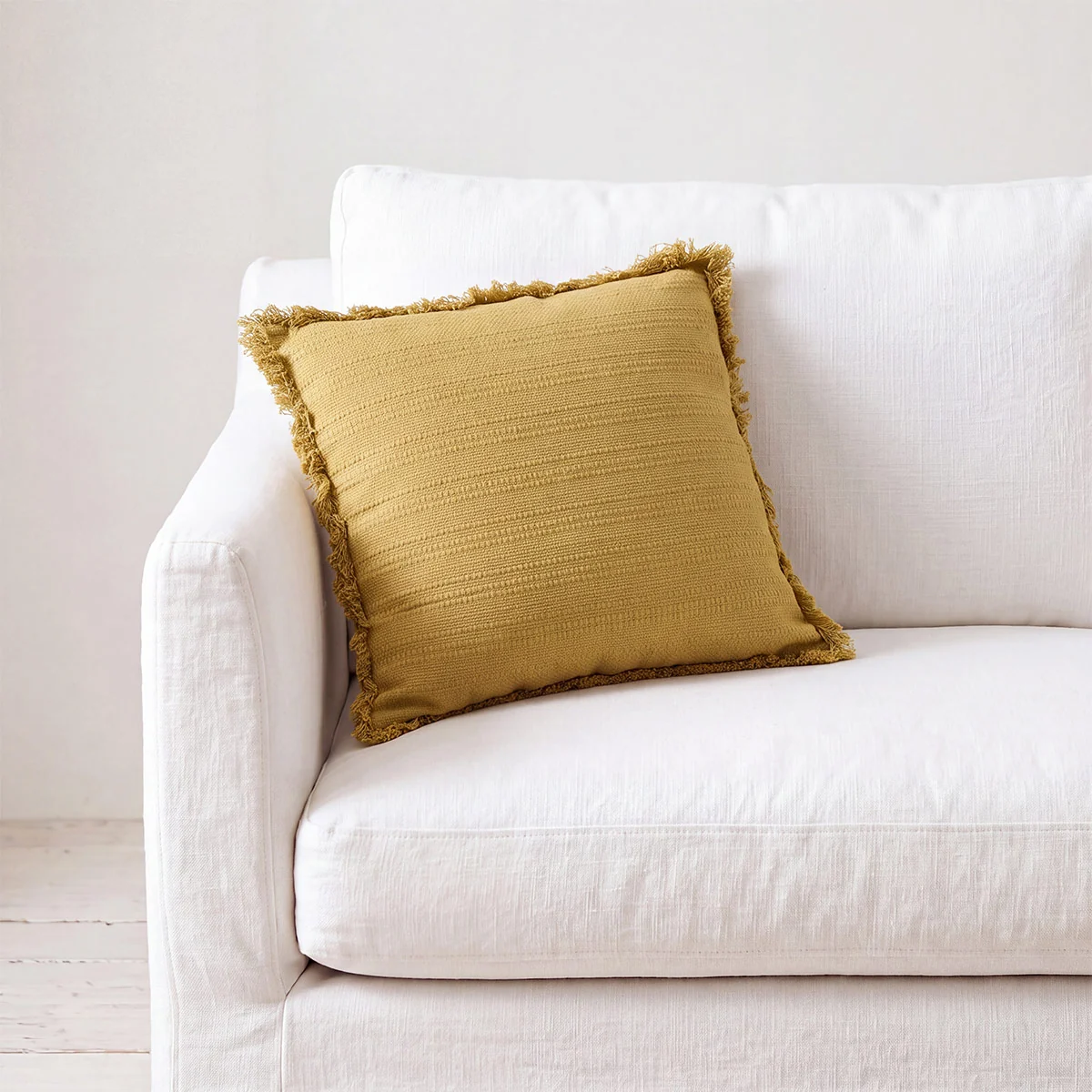 COJÍN RIPLEY HOME TEXTURA FRINGE 45X45 CM AMARILLO - 1