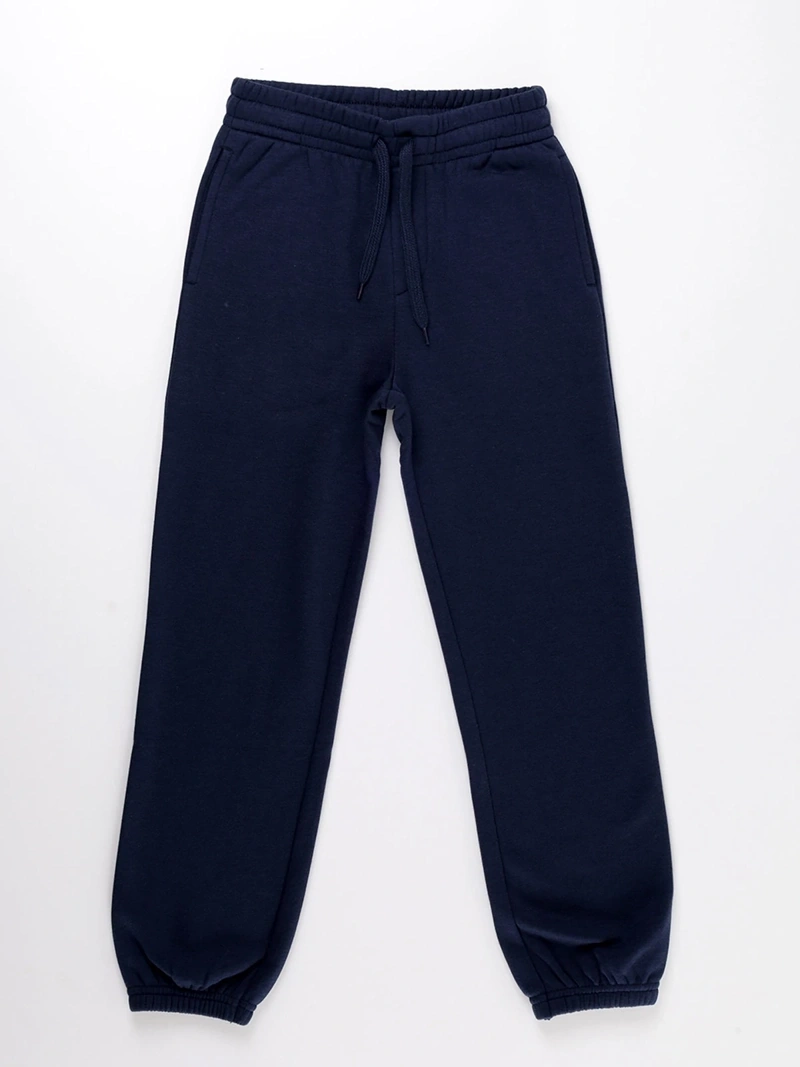 PANTALÓN DE BUZO PUÑO NIÑO HARVEST - 1