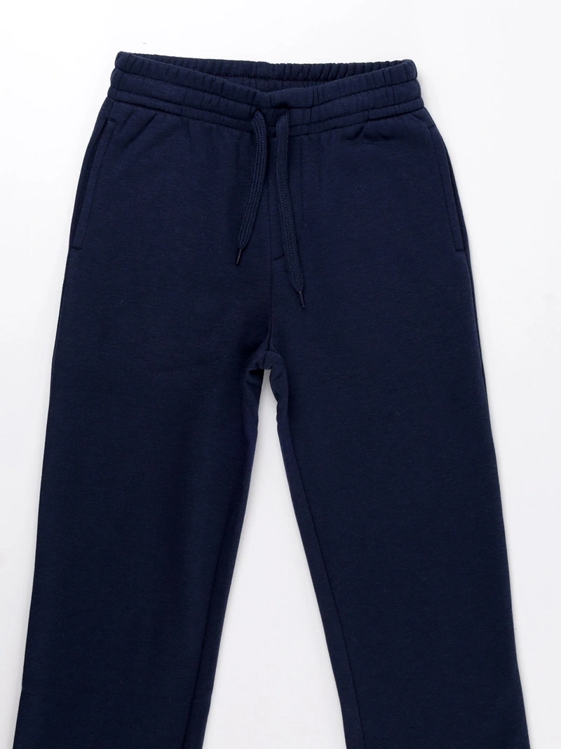 PANTALÓN DE BUZO PUÑO NIÑO HARVEST - 3